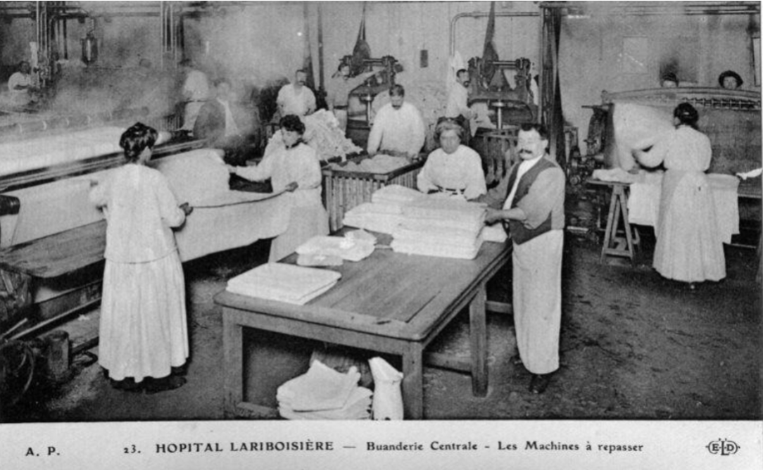 Laundry workers at Lariboisière hospital, c. 1900, processing laundry