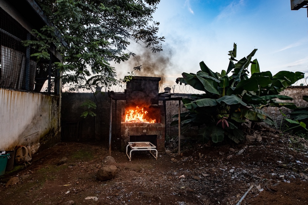 An incinerator burns medical waste in Sierra Leone.
