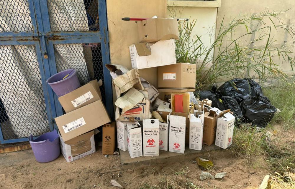 Medical waste sits outside a medical facility in Senegal