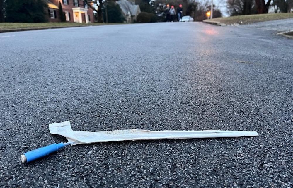 Medical implement discarded on road