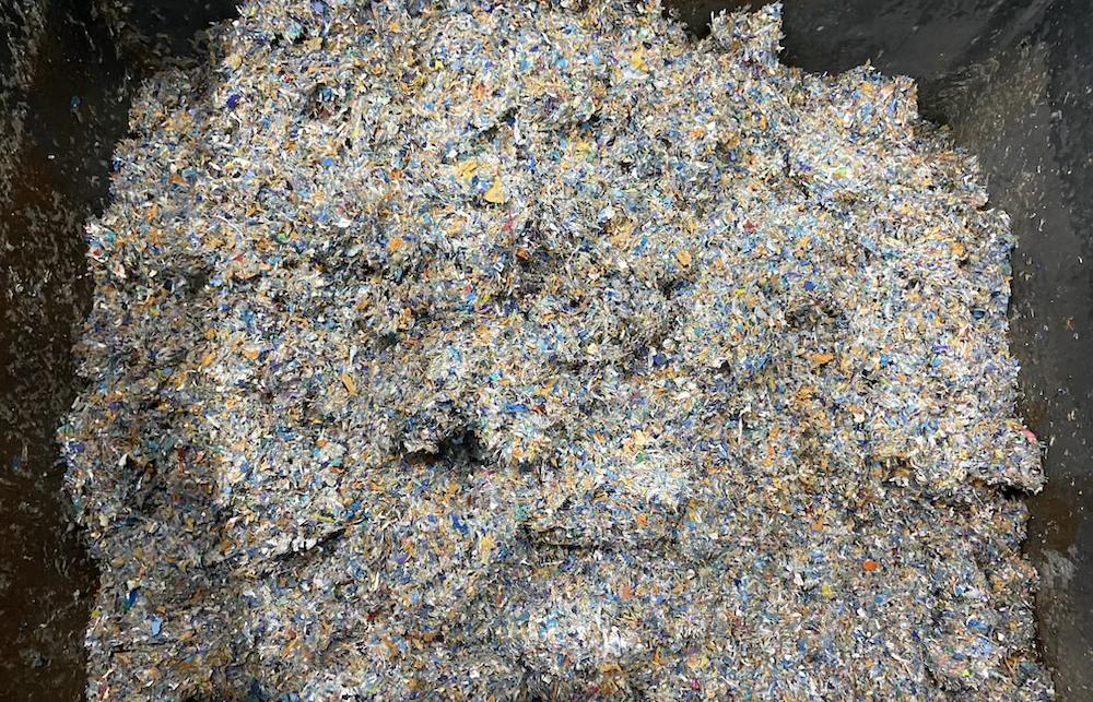 A close up of discarded and compressed plastic medical waste