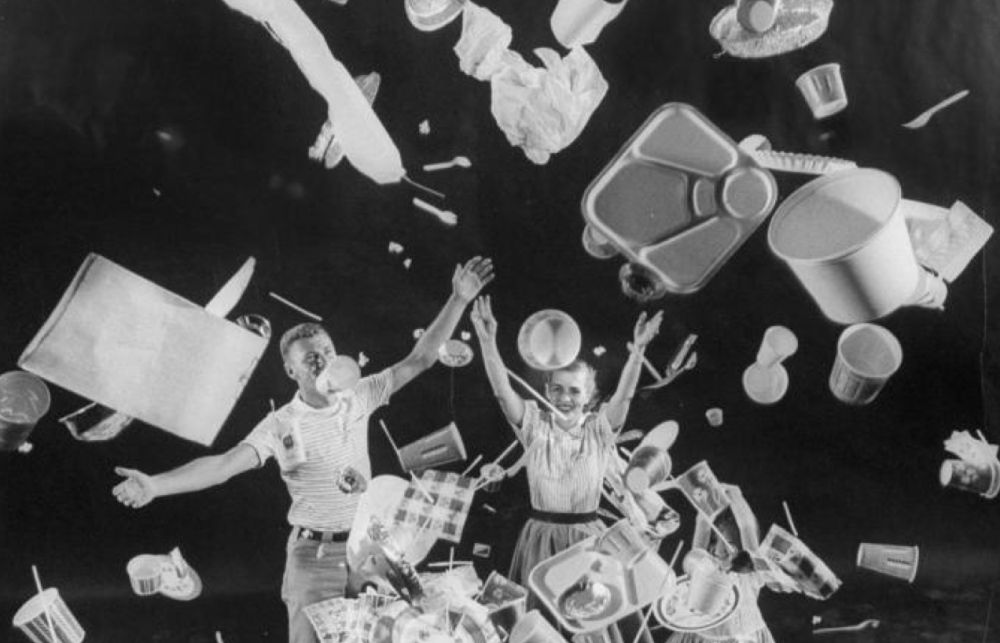A black and white advert where a group of four people are throwing medical devices into the air. 